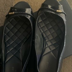 Black Emory Wedge Braided black peep toe shoes.